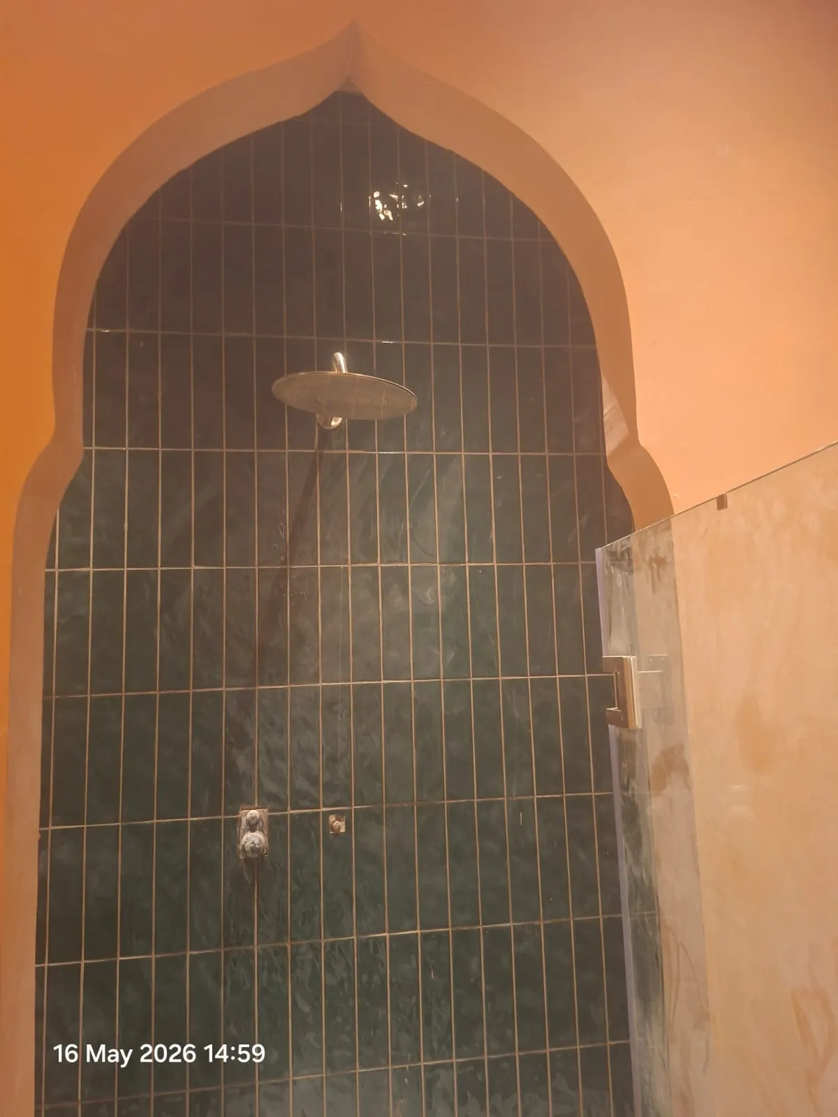 Arabesque Arch Shower with Green Wall Tiles – Tiling & Tile Fixing in Dubai by Pasupati Technical Services