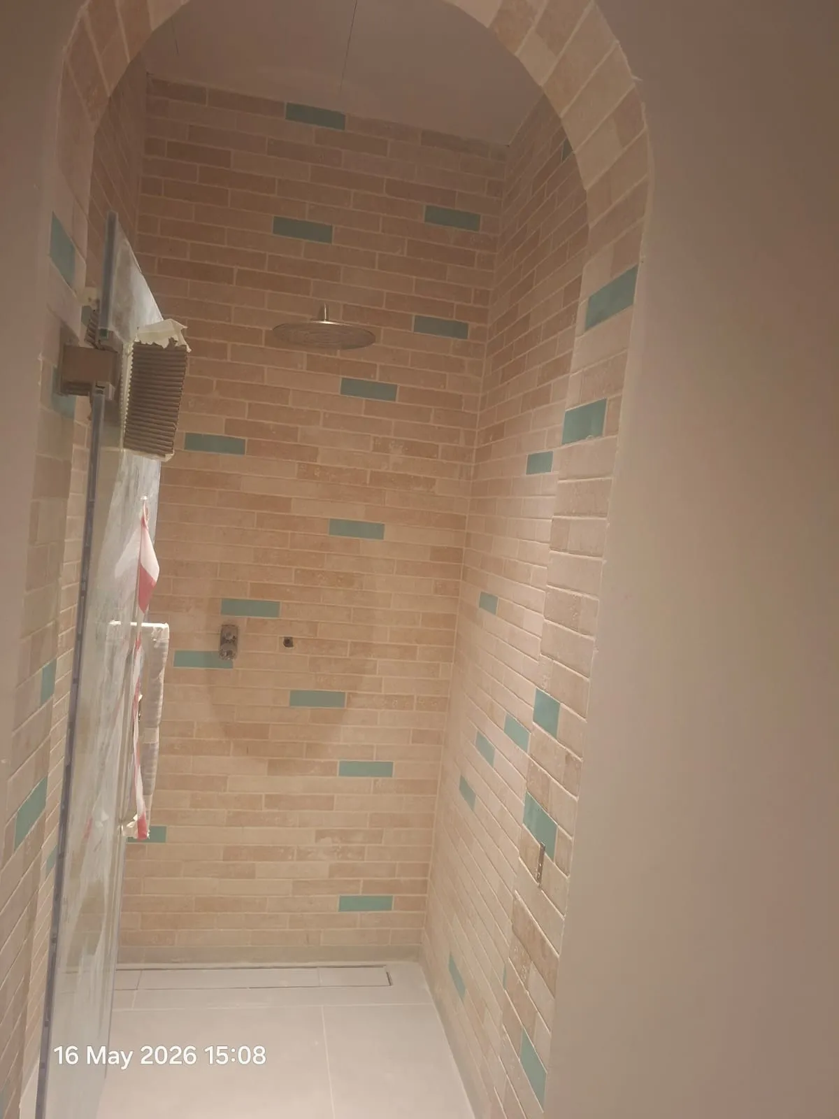 Arched Shower Brick Effect Wall Tiles – Tiling & Tile Fixing in Dubai by Pasupati Technical Services