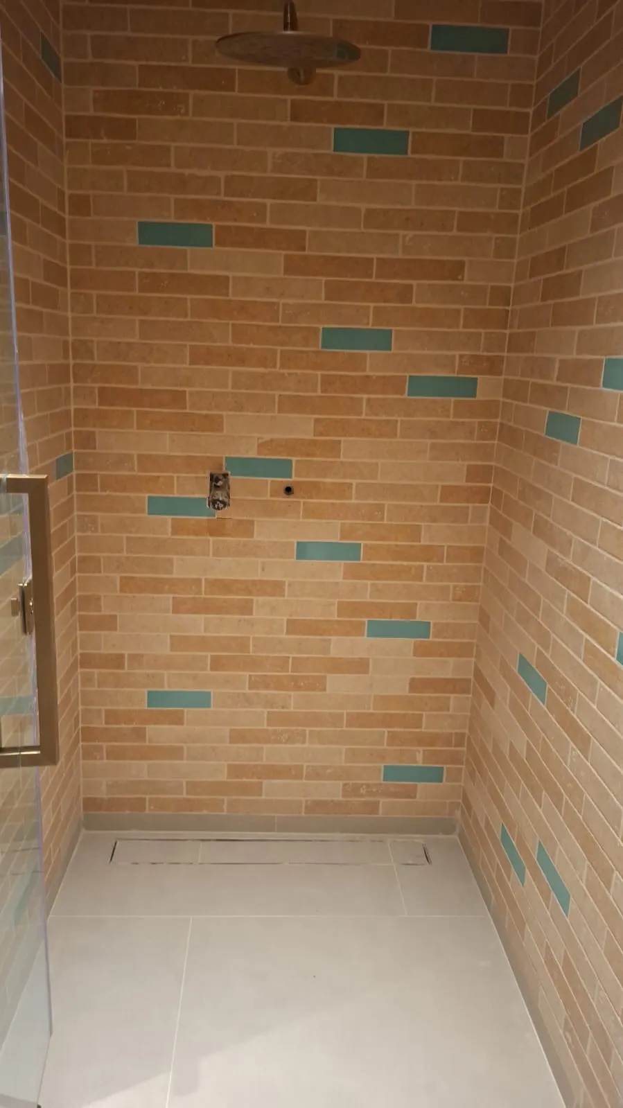 Brick Effect Shower Wall Tiles – Tiling & Tile Fixing in Dubai by Pasupati Technical Services