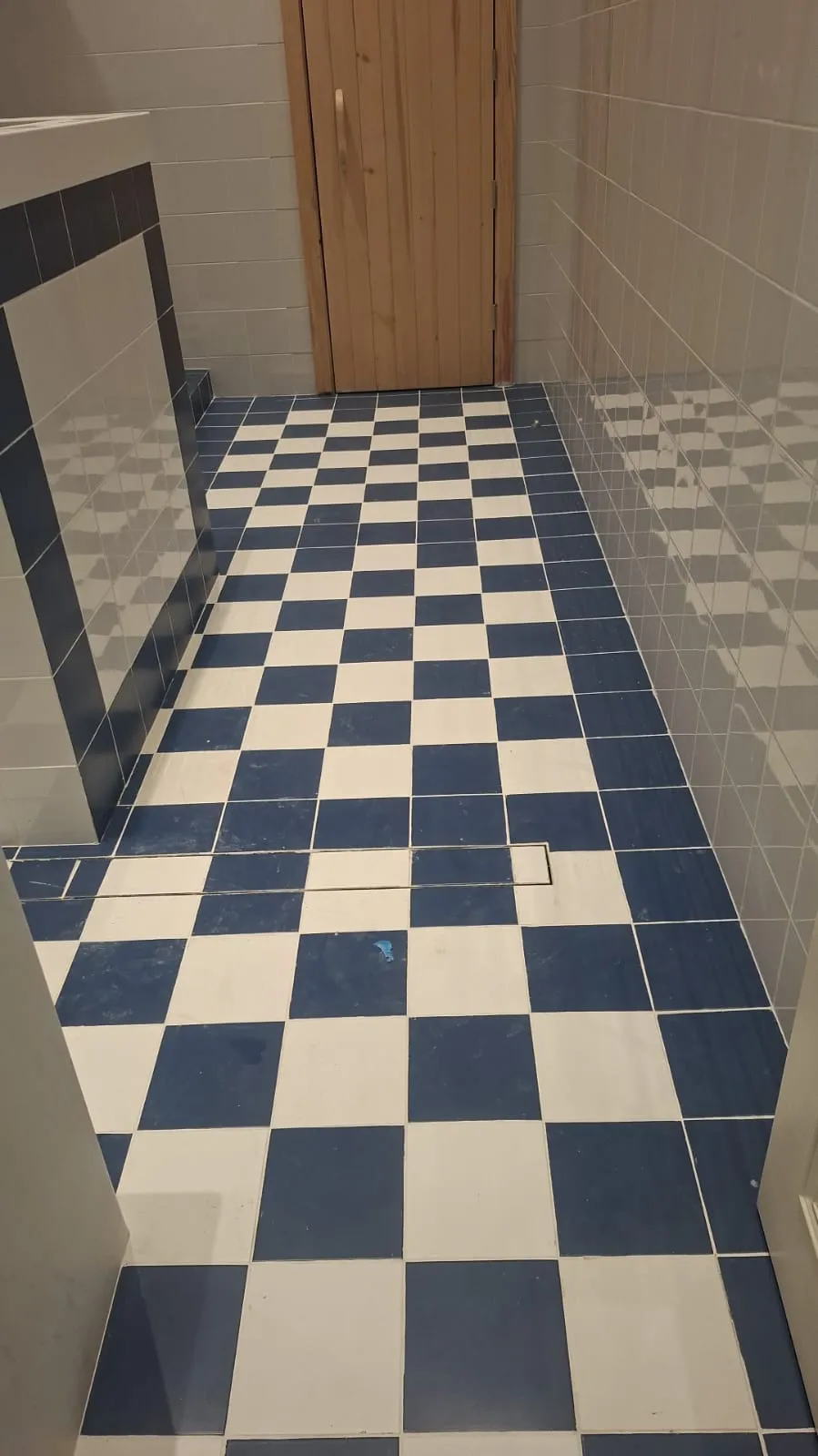 Checkerboard Floor Tiles Bathroom View – Tiling & Tile Fixing in Dubai by Pasupati Technical Services