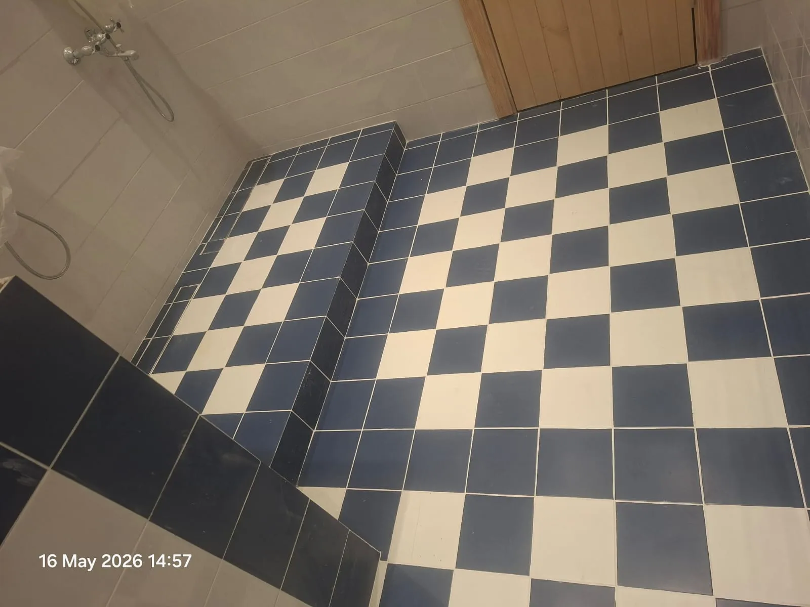 Checkerboard Shower Platform Tiling – Tiling & Tile Fixing in Dubai by Pasupati Technical Services