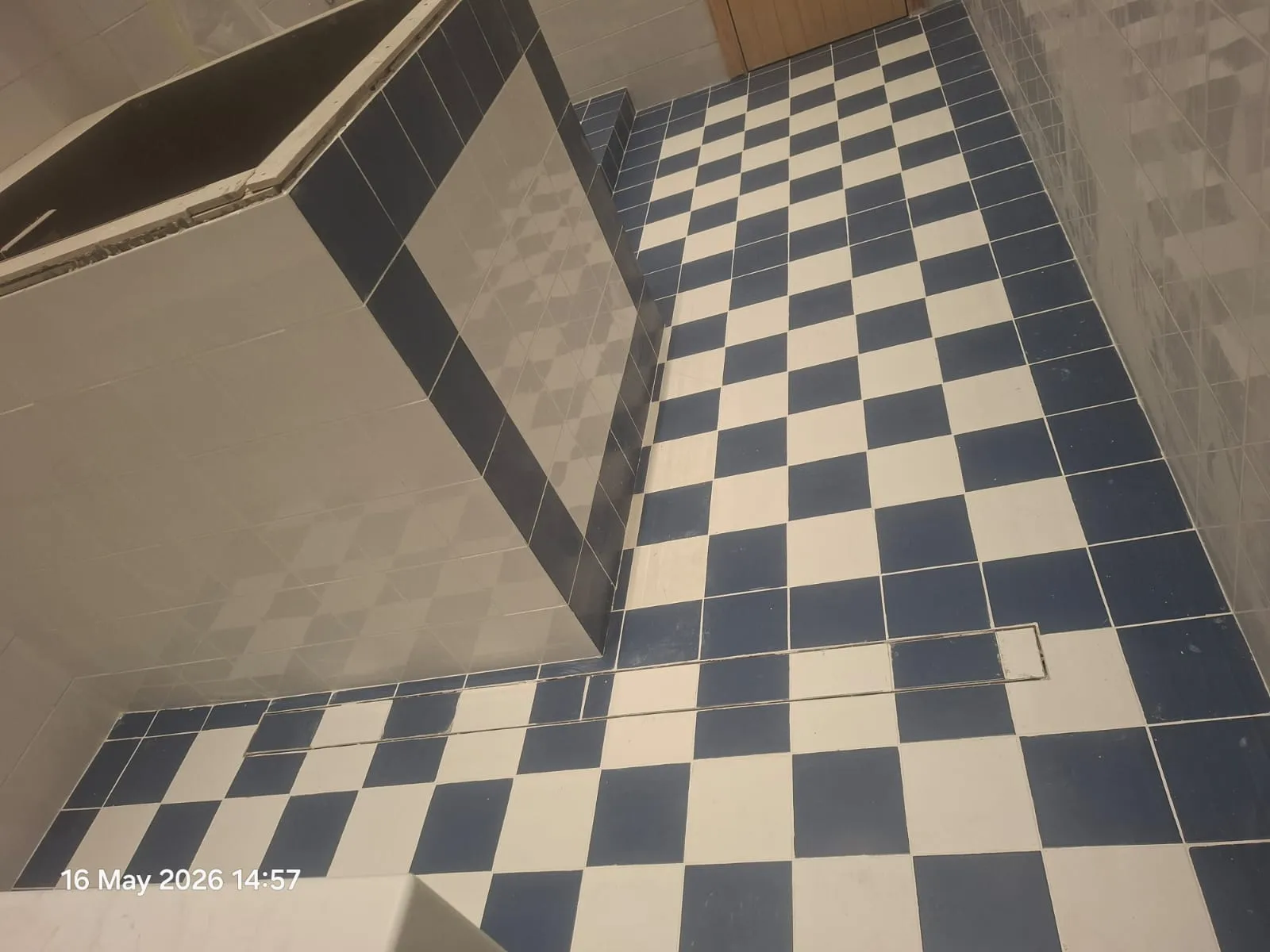 Checkerboard Tiled Bench and Floor – Tiling & Tile Fixing in Dubai by Pasupati Technical Services