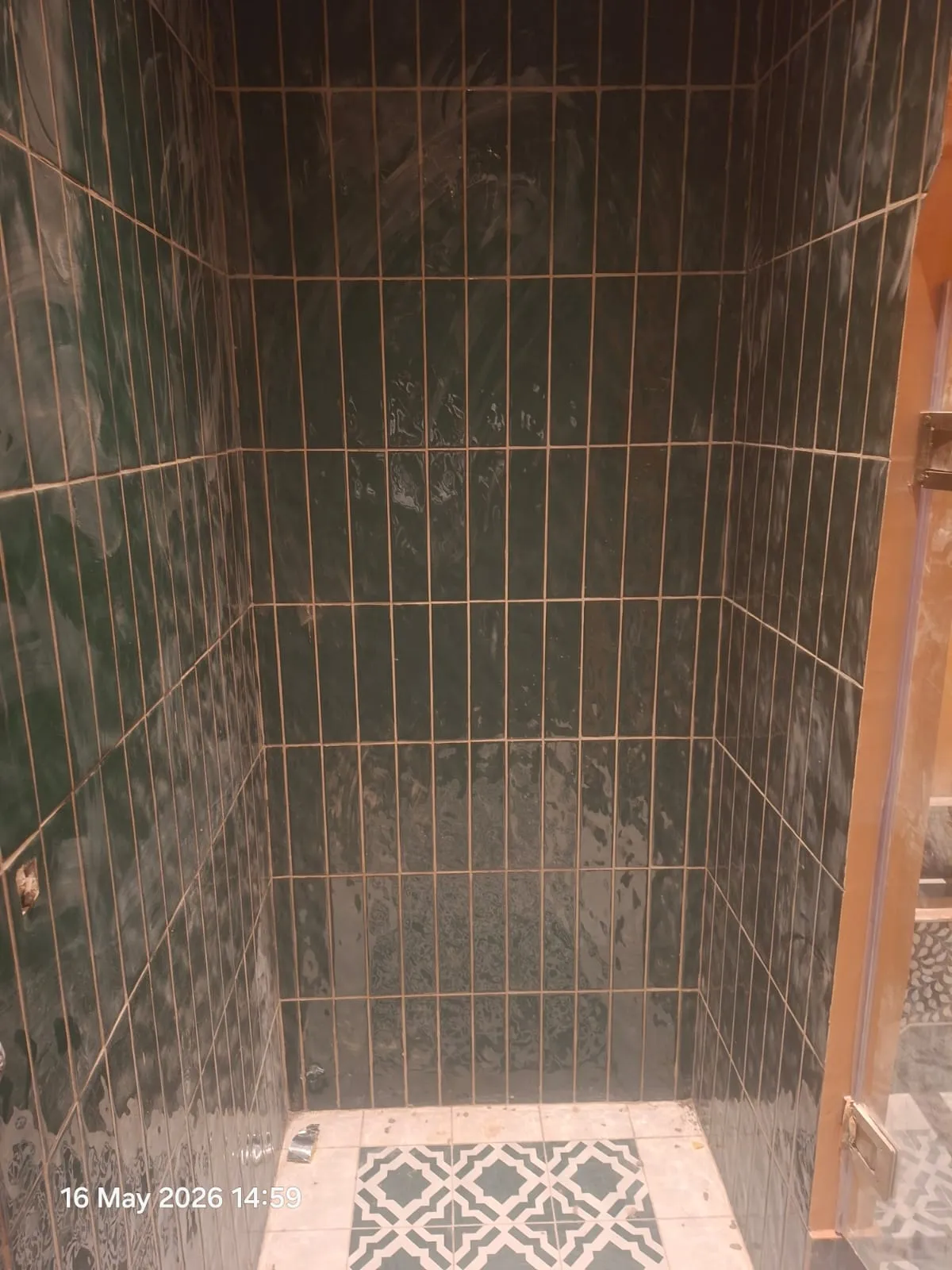 Green Gloss Tiled Shower with Patterned Floor – Tiling & Tile Fixing in Dubai by Pasupati Technical Services