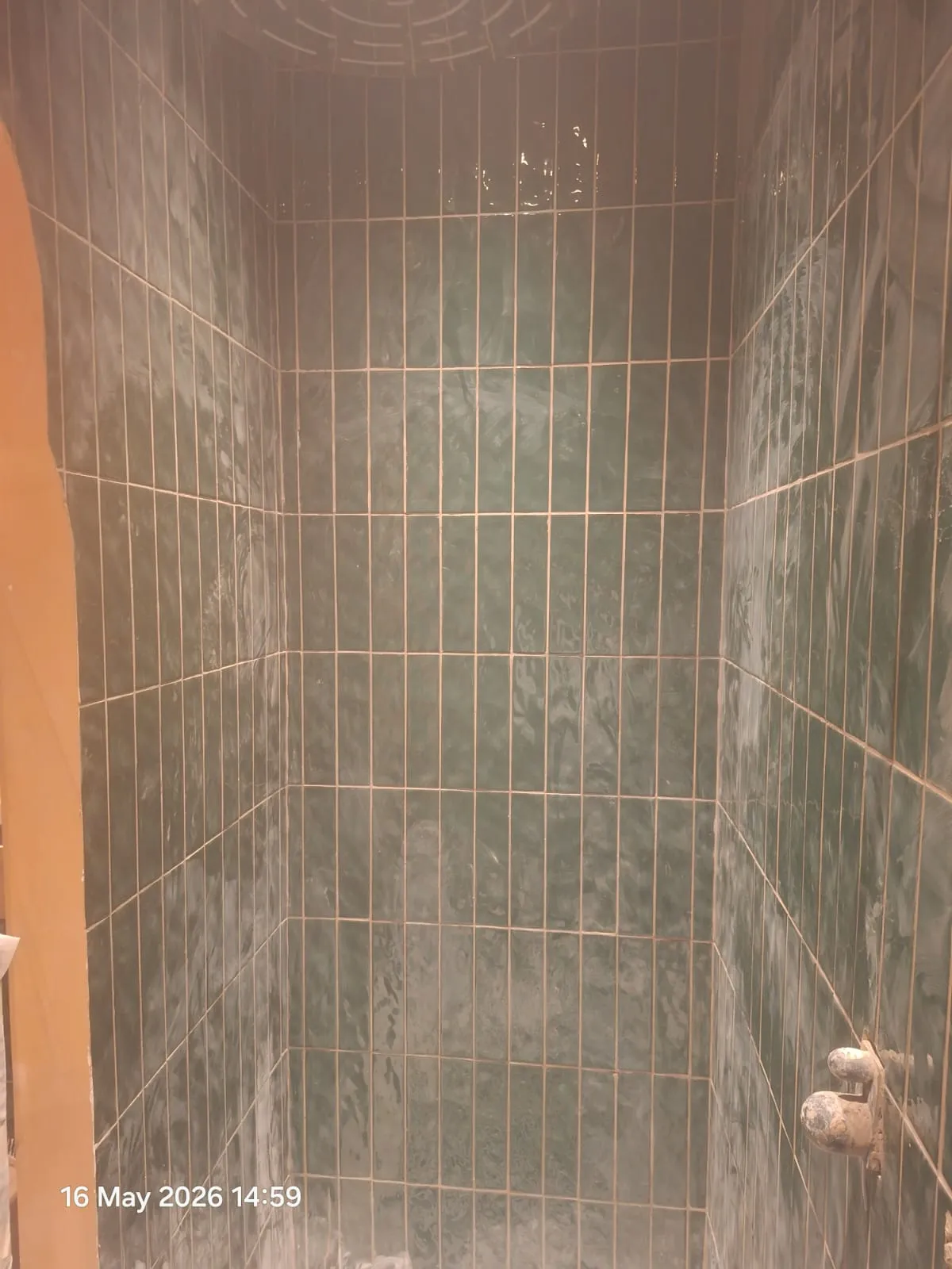 Green Vertical Gloss Tile Shower – Tiling & Tile Fixing in Dubai by Pasupati Technical Services