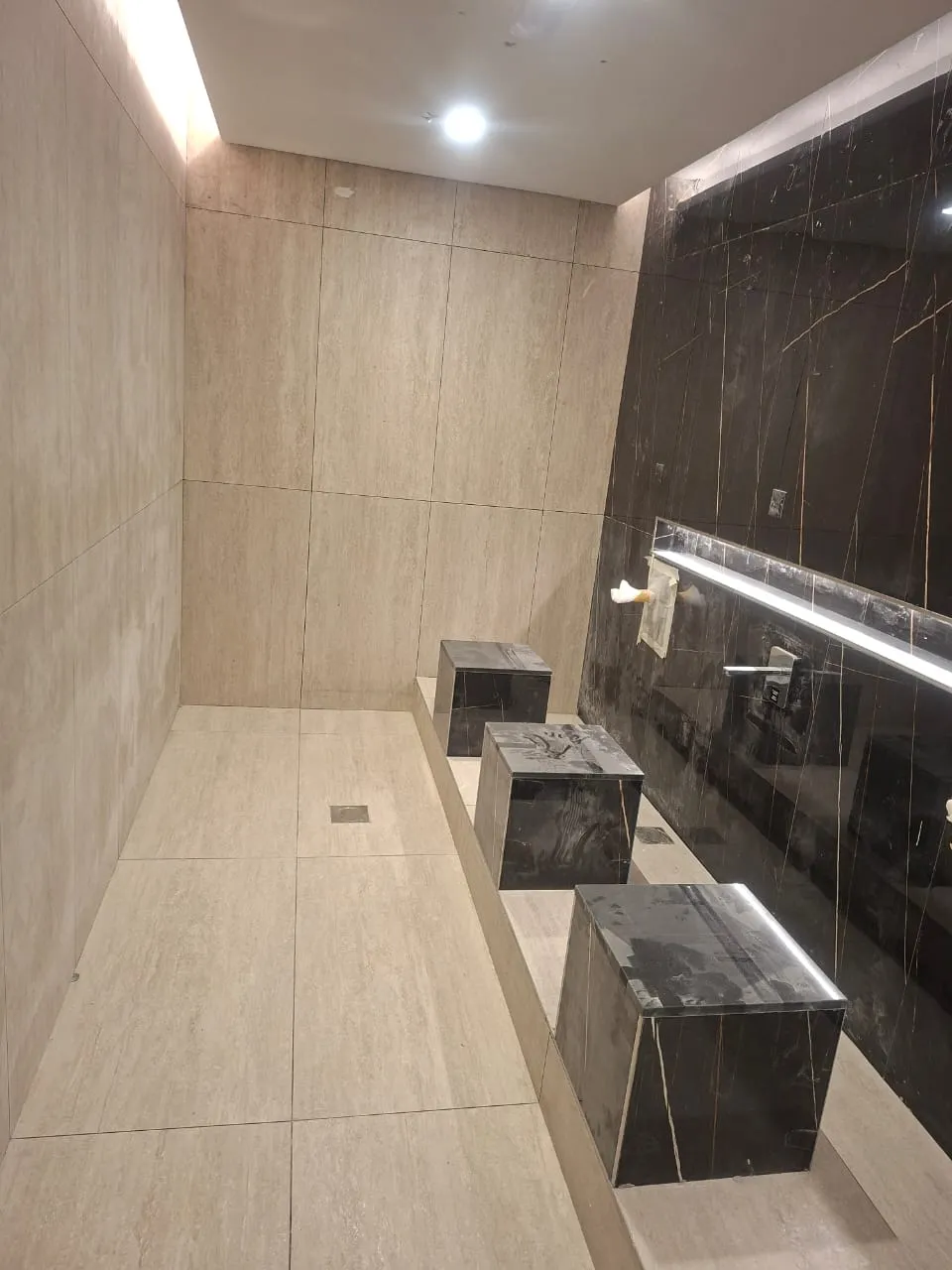 Marble Look Washroom Wall and Floor Tiles – Tiling & Tile Fixing in Dubai by Pasupati Technical Services