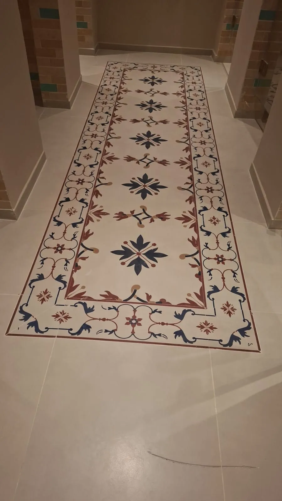 Patterned Tile Rug Inlay in Corridor – Tiling & Tile Fixing in Dubai by Pasupati Technical Services