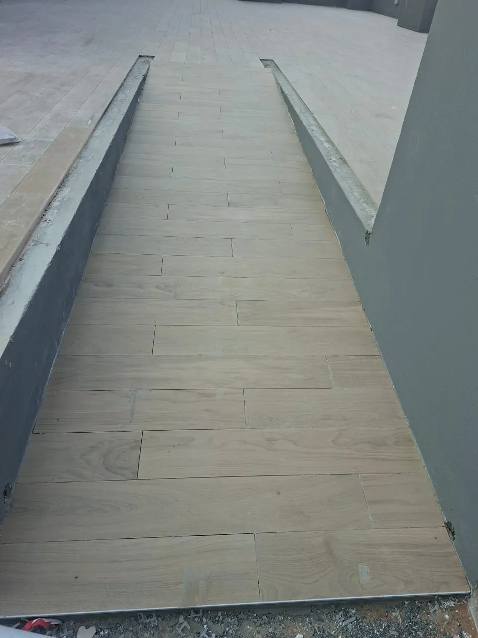 Wood Effect Tiled Ramp – Tiling & Tile Fixing in Dubai by Pasupati Technical Services
